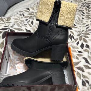 Stylish Black Heeled Boots with Cream Lining